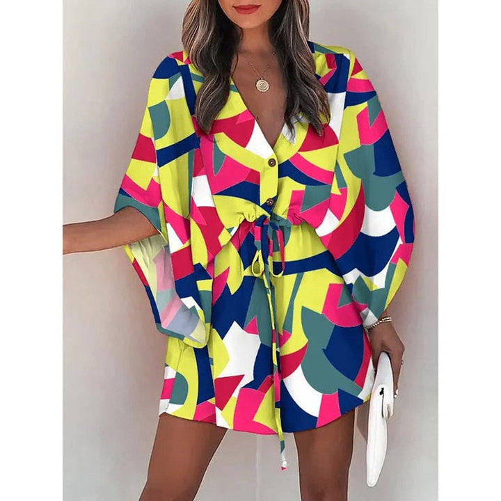 Mini vestito donna floreale con maniche a pipistrello, vita regolabile, stile chic estivo.