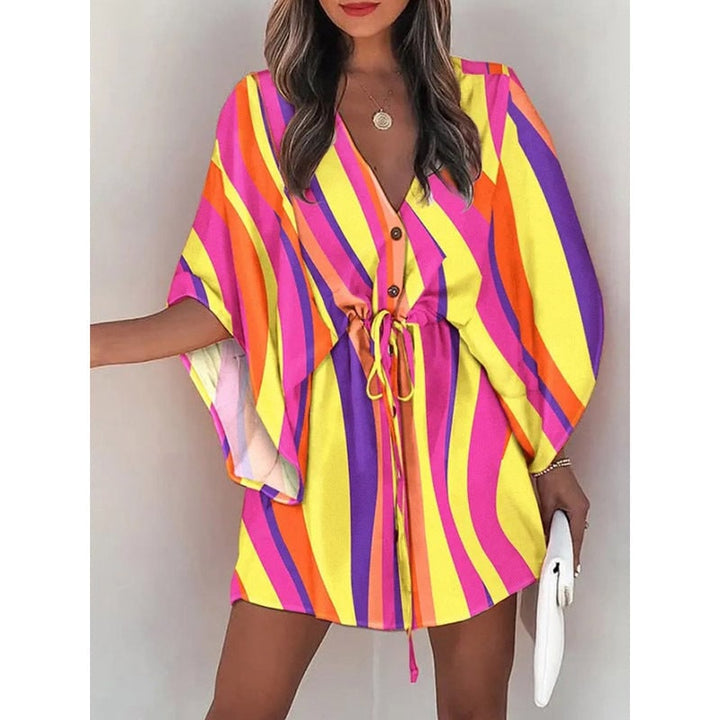 Abito donna floreale con vita regolabile, maniche a pipistrello, perfetto per la moda estiva.