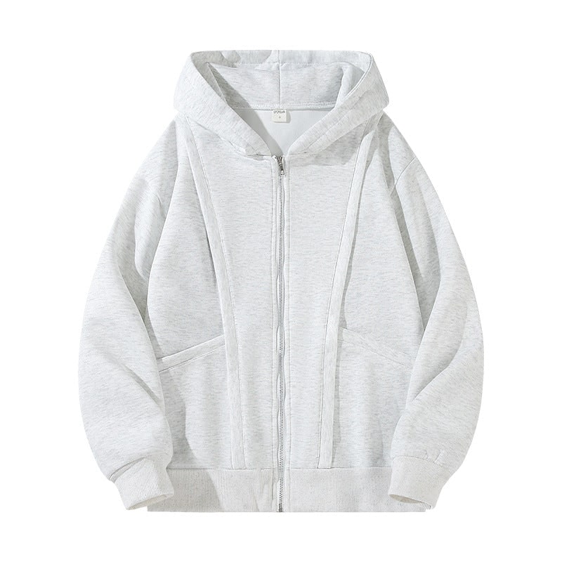 Comoda felpa donna casual grigia, con cappuccio e cerniera, perfetta per il tempo libero e l'abbigliamento versatile.