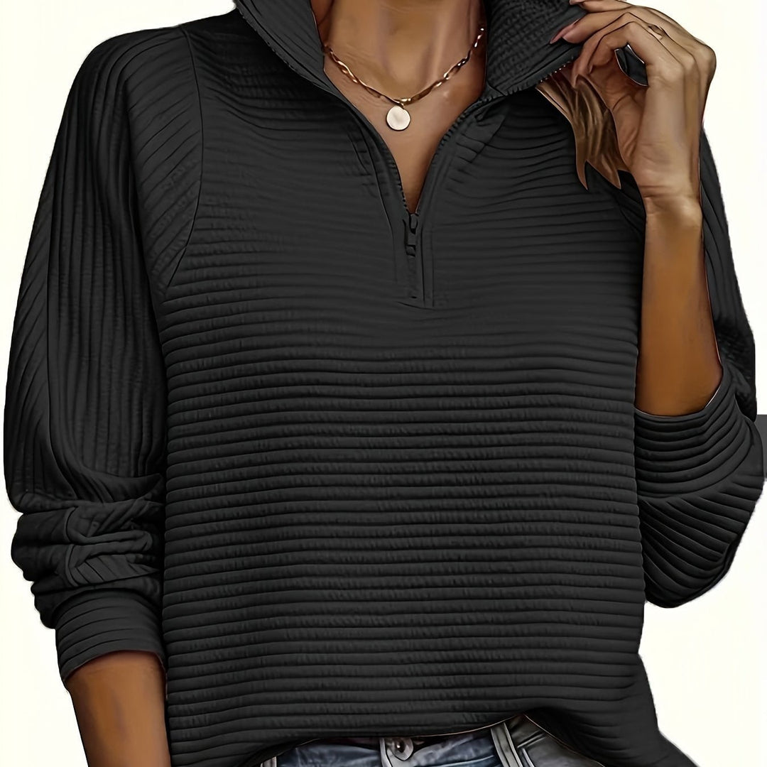 Felpa donna trendy, mezzo zip, collo alto testurizzato. Perfetta per la moda autunnale.