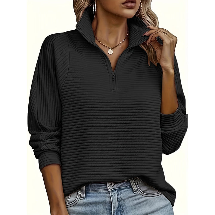 Abbigliamento donna: felpa versatile, mezzo zip, collo alto testurizzato. Stile e comfort.