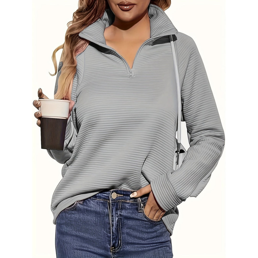 Pullover donna con collo alto e mezzo zip, testurizzato. Stile casual per tutte le stagioni.