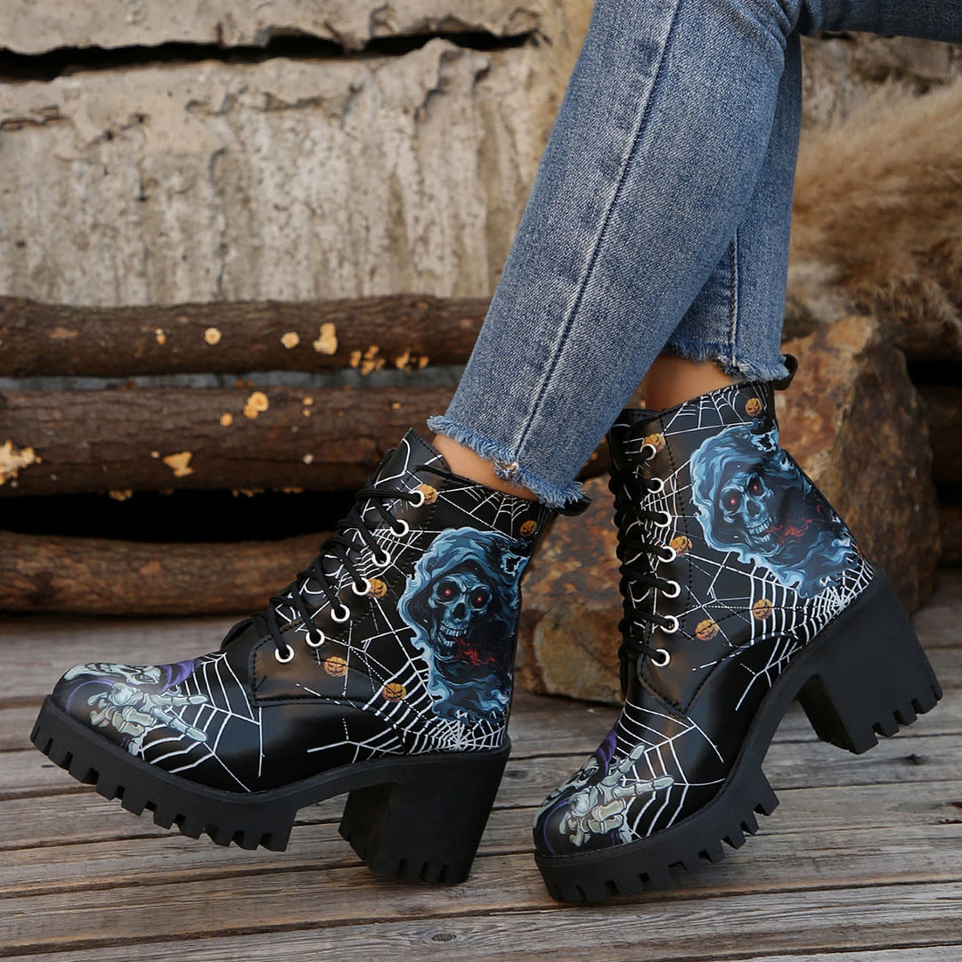 Stivali donna gialli con zeppa alta, design ragnatela e tacco, stile combat per Halloween.