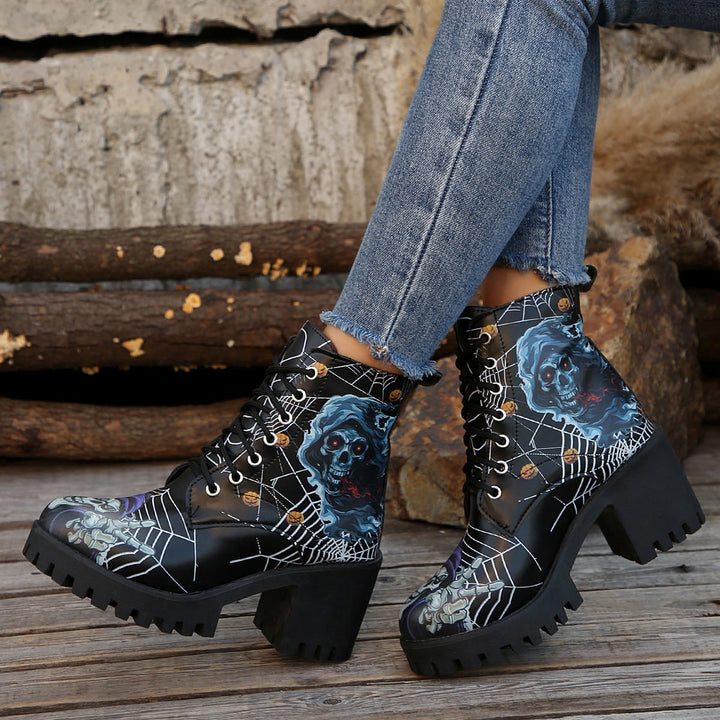 Stivali donna gialli con zeppa alta, design ragnatela e tacco, stile combat per Halloween.
