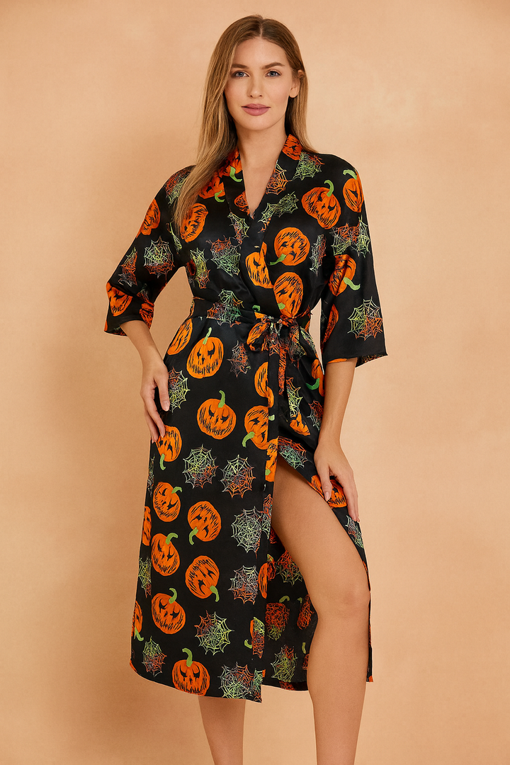 Costume vestaglia donna Halloween con fantasie zucca e ragnatela. Ottima per feste e travestimenti a tema.