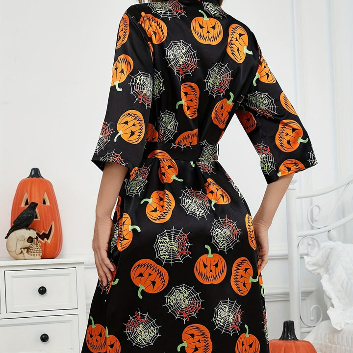 Elegante vestaglia kimono Halloween con stampa zucca e ragnatela. Un regalo donna perfetto per la moda autunnale.