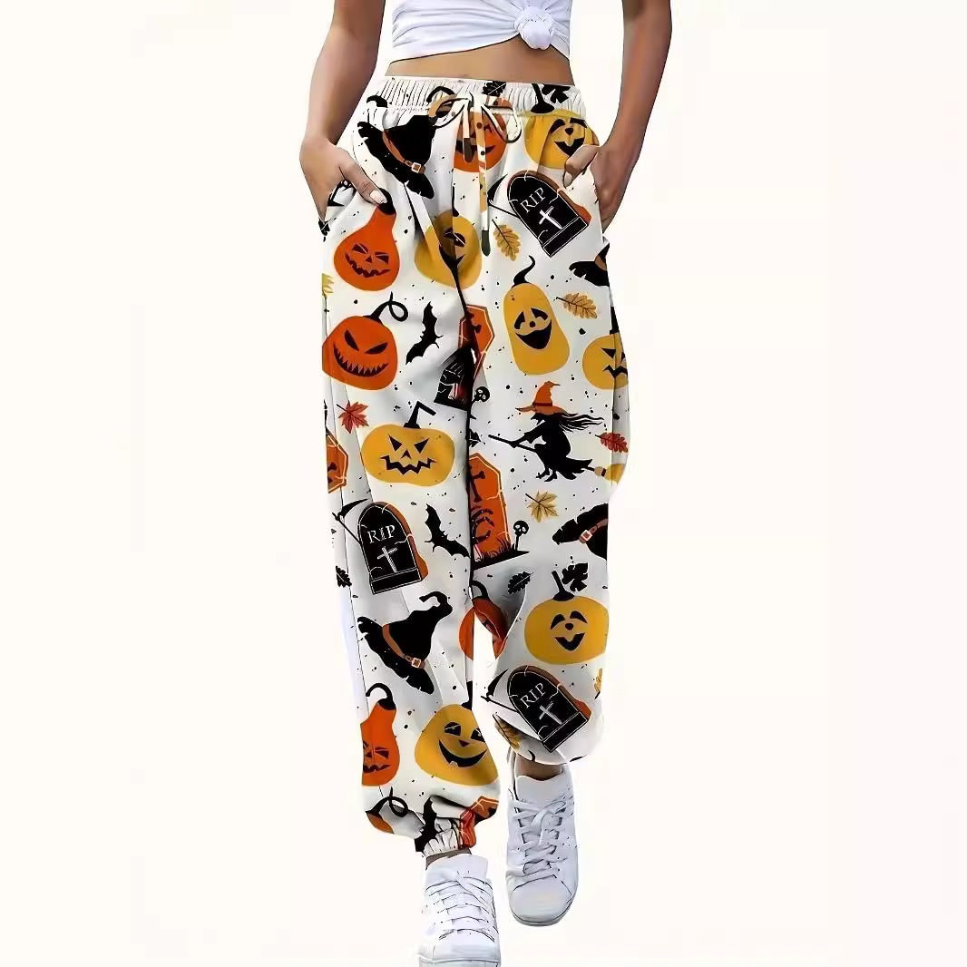 Pantaloni tuta jogger donna Halloween con stampa zucche e streghe, perfetti per look casual festivi.