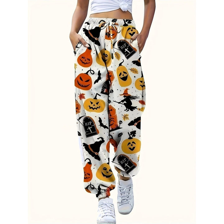 Pantaloni jogger tuta donna per Halloween con stampa tematica di zucche e streghe, ideali per feste o relax.