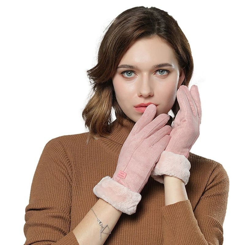 Guanti riscaldati da donna per sport invernali e passeggiate. Abbigliamento termico che offre calore e comfort.