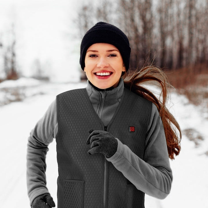 Abbigliamento termico: gilet riscaldato donna USB, elegante e slim fit, perfetto per le giornate fredde all'aperto.