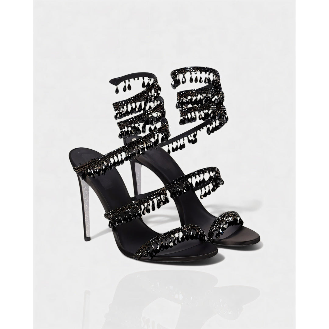 Scarpe tacco alto donna per eventi speciali, con nappe brillanti e cinturino caviglia.