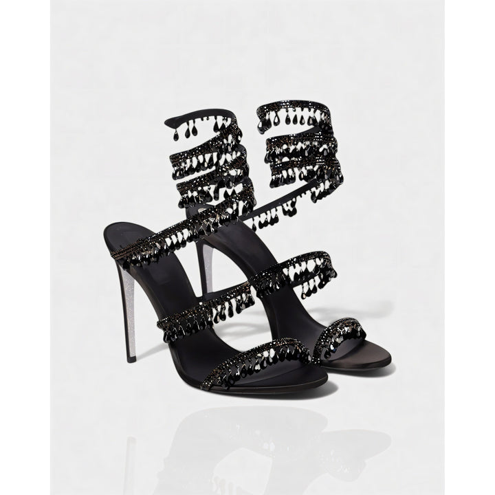 Scarpe tacco alto donna per eventi speciali, con nappe brillanti e cinturino caviglia.