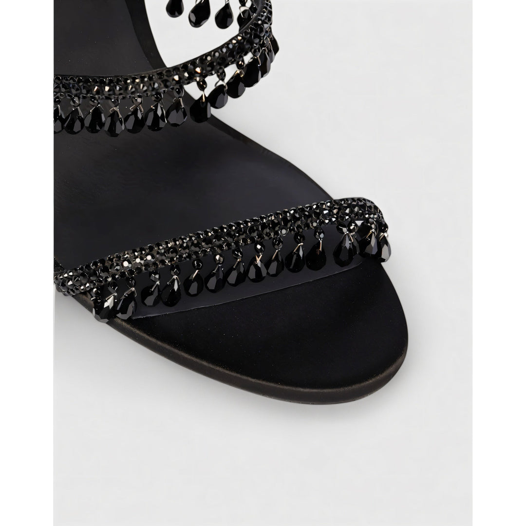 Tacchi alti glamour donna, stiletto con nappe brillanti e cinturino alla caviglia.