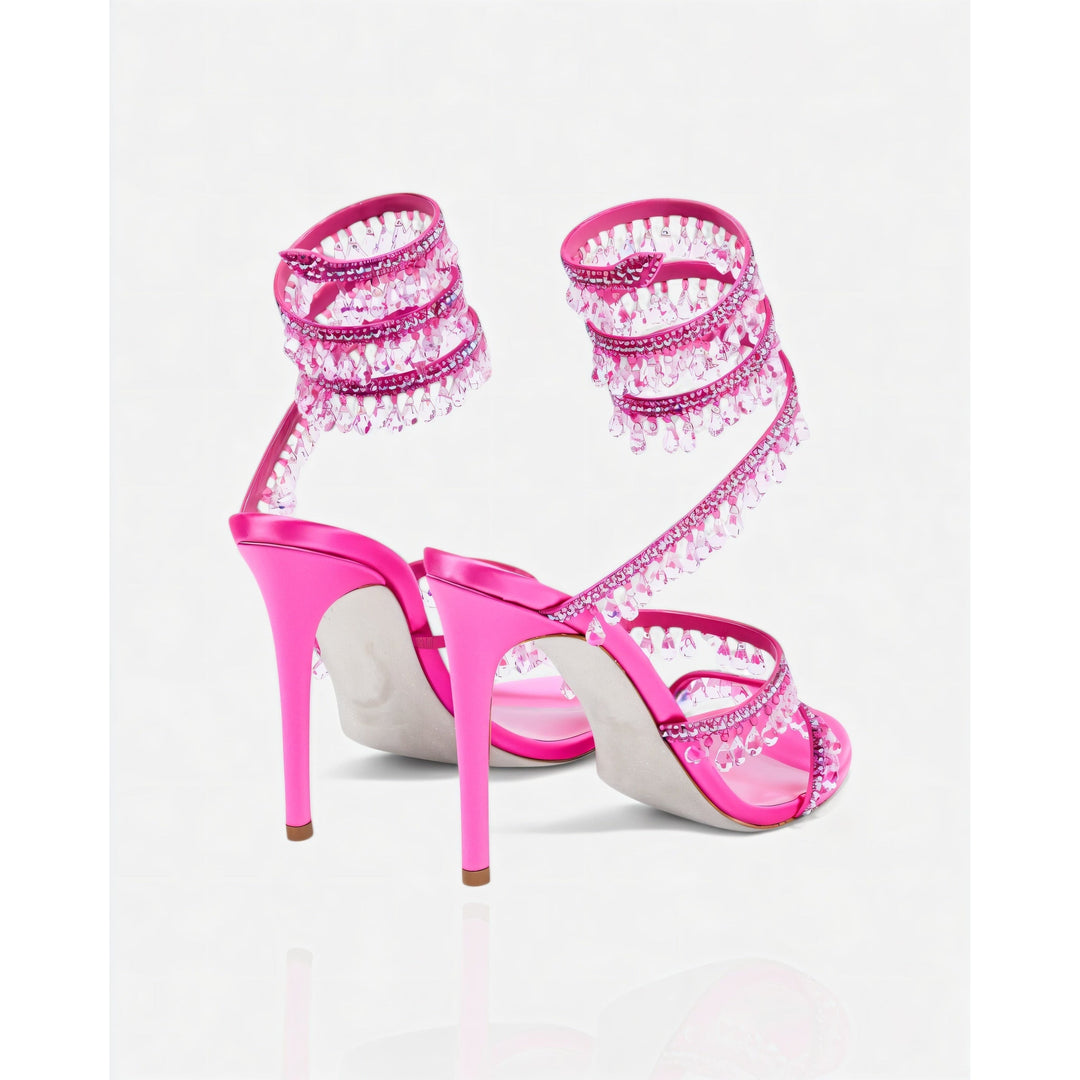 Stiletto donna con nappe lucide e cinturino alla caviglia. Glamour per ogni evento.