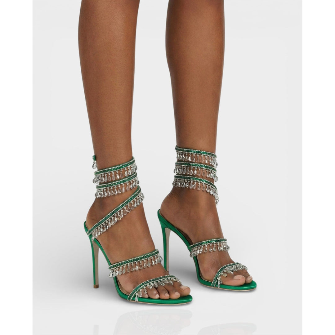 Tacchi alti donna stiletto con nappe brillanti e cinturino alla caviglia. Eleganza pura.