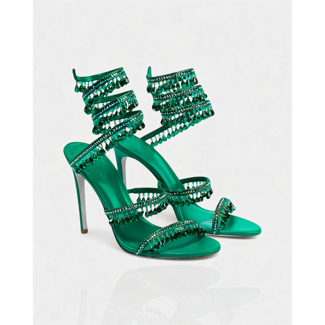 Tacchi alti stiletto da donna con nappe scintillanti e cinturino caviglia. Perfetti per feste.