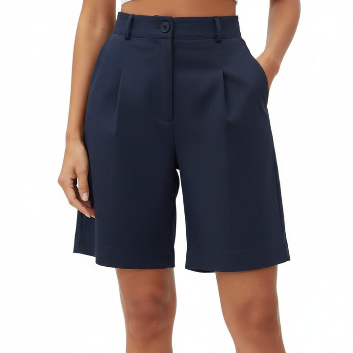 Pantaloncini bermuda donna eleganti per l'ufficio. Vita alta, gamba larga e dettagli pieghettati estivi.