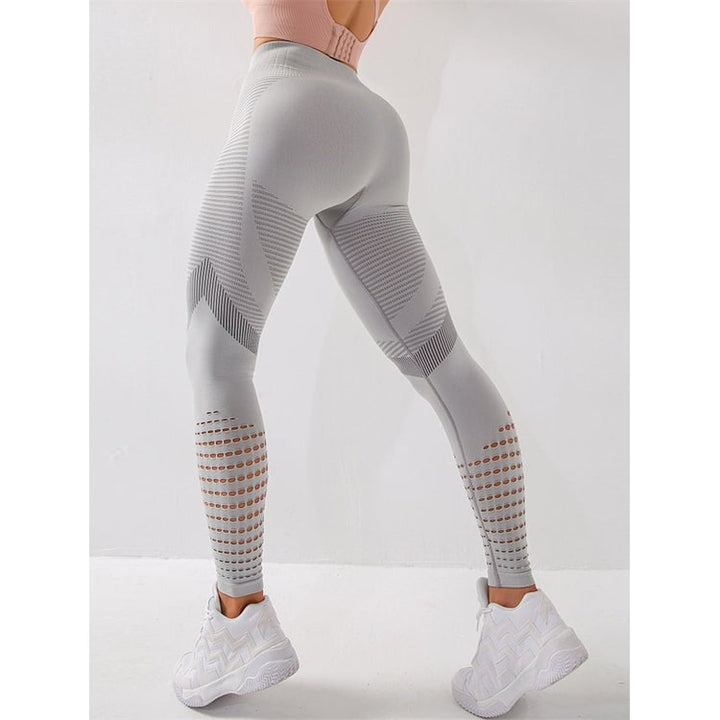 Leggings donna modellanti vita alta compressione, ideali per yoga. Tessuto traspirante e aderente.