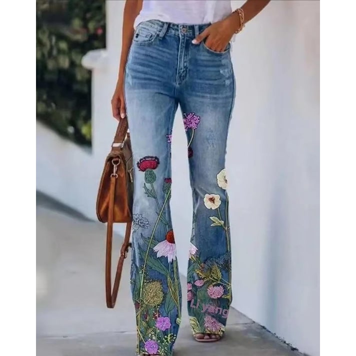 Pantaloni jeans donna con stampa floreale e botanica, modello svasato a vita alta, stile vintage.