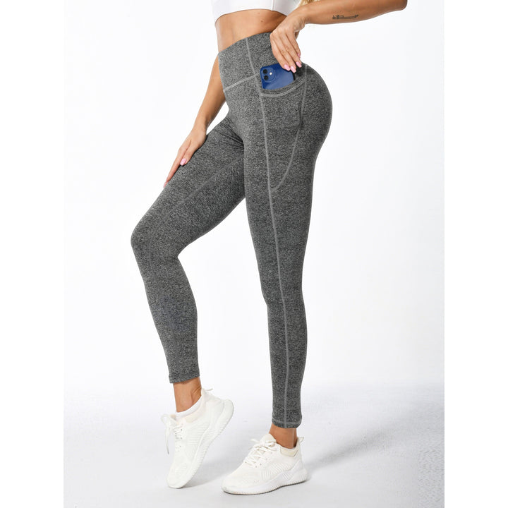 Leggings modellanti a vita alta da donna con tasche, offrono supporto per yoga, fitness e allenamento.