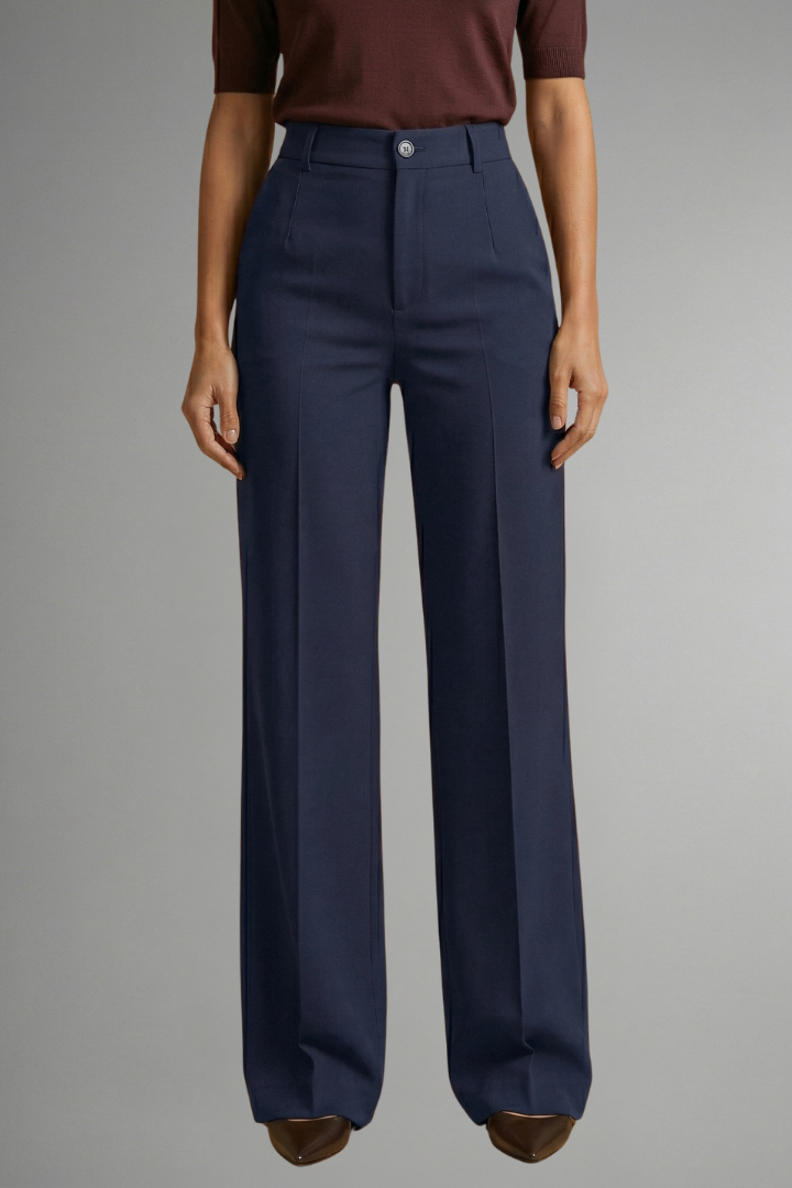 Pantaloni donna primavera/autunno, vita alta e gamba larga. Dettagli bottoni per un look elegante e sartoriale.
