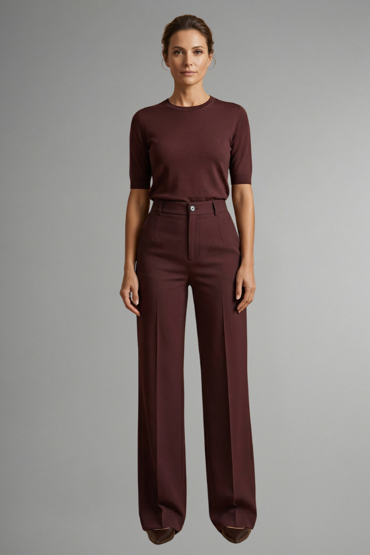 Pantaloni donna vita alta con bottoni decorativi, gamba larga sartoriale. Perfetti per un outfit elegante o casual alla moda.