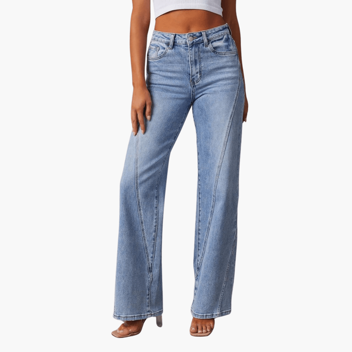 Jeans larghi donna lavaggio chiaro, vita alta. Perfetti per outfit casual o eleganti, aggiungono un tocco vintage.