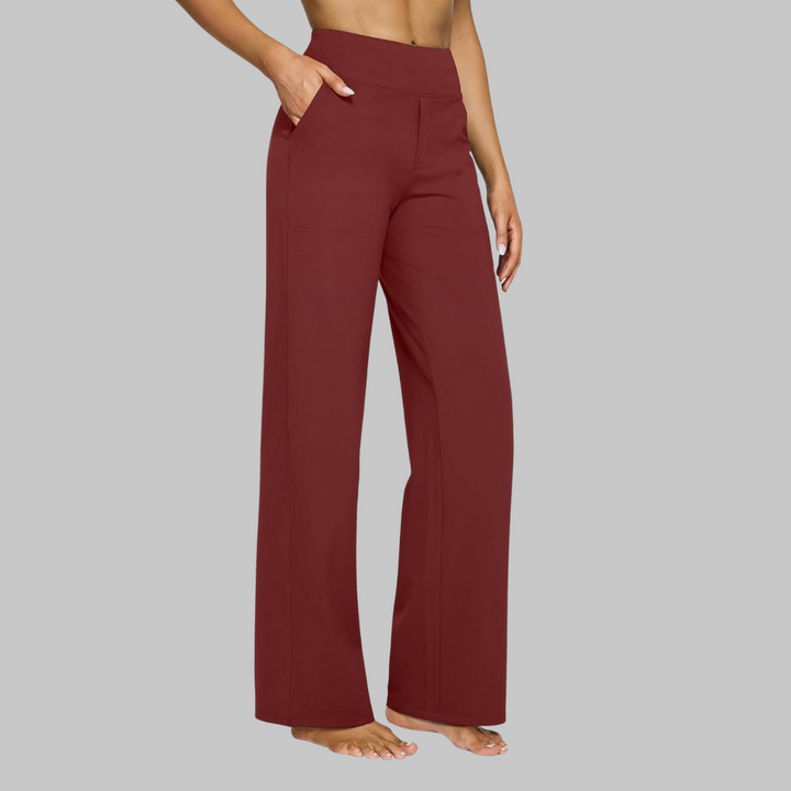 Pantaloni da ufficio donna, vita alta e gamba larga, che uniscono eleganza e praticità.