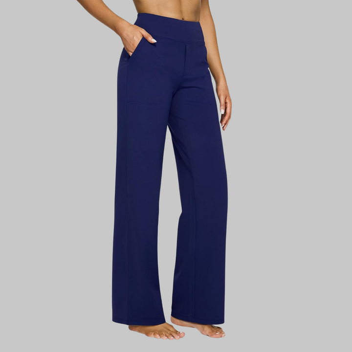 Pantaloni donna a gamba larga, vita alta, in tessuto morbido ed elasticizzato per comfort estremo.