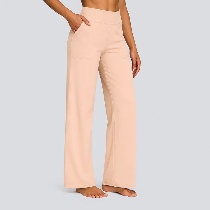 Pantaloni donna con vita alta e gamba ampia, perfetti per un tocco di eleganza nella moda quotidiana.