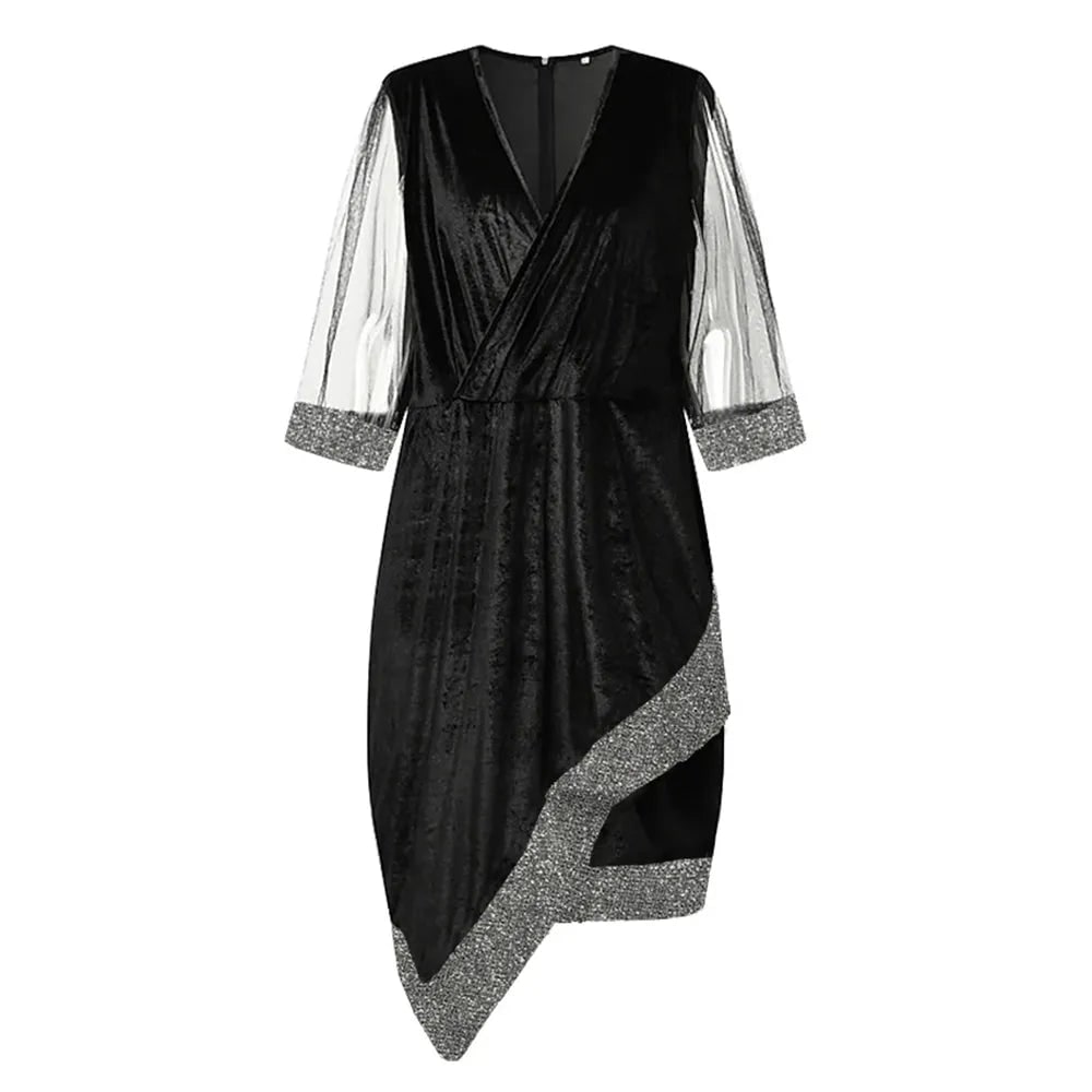 Abito midi elegante e confortevole, con paillettes e maniche velate. Ideale per ballare con stile.
