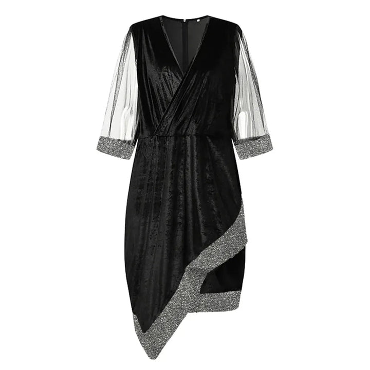 Abito midi elegante e confortevole, con paillettes e maniche velate. Ideale per ballare con stile.