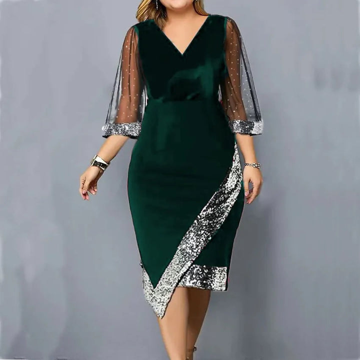 Vestito midi donna elegante con paillettes scintillanti e delicate maniche velate.