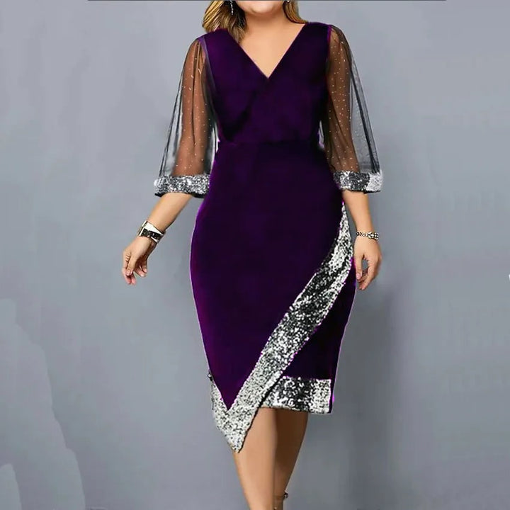 Dettagli paillettes sul corpetto di questo vestito midi donna elegante, con maniche velate.