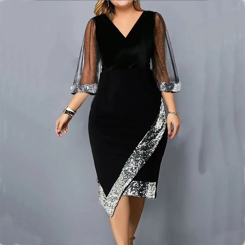 Vestito cerimonia midi donna elegante, con paillettes luminose e maniche velate.