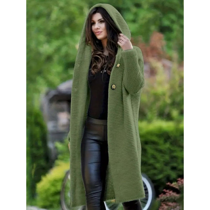 Comodo maglione lungo donna con cappuccio e chiusura a bottoni, ottimo per strati e stile rilassato.