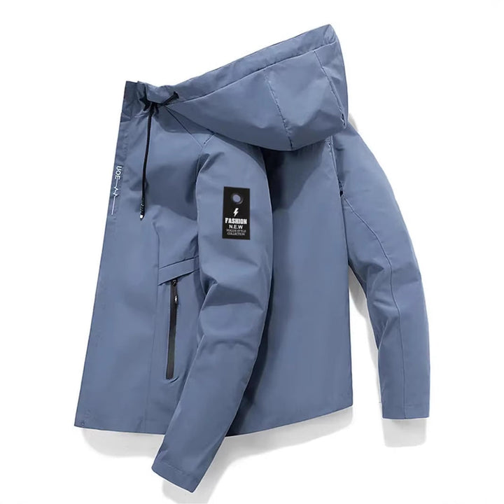 Giacca impermeabile donna leggera, con cappuccio e tasche con zip, ideale per primavera e autunno.