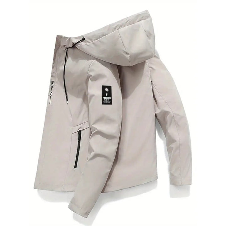 Giacca a vento donna, impermeabile, con cappuccio, tasche zip e vestibilità regolabile. Stile sportivo.