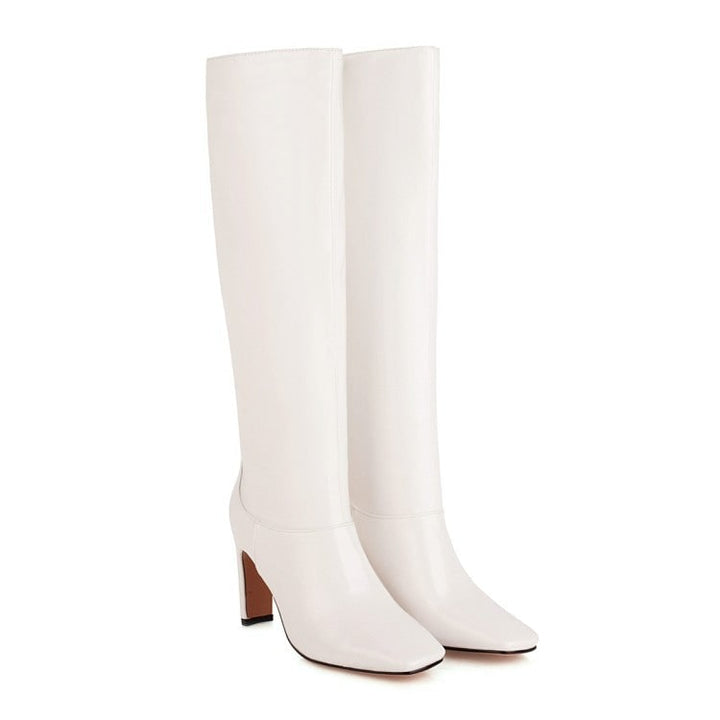 Stivali al ginocchio da donna con punta quadrata e tacco grosso, ideali per la moda autunno inverno. Stile elegante e comfort.