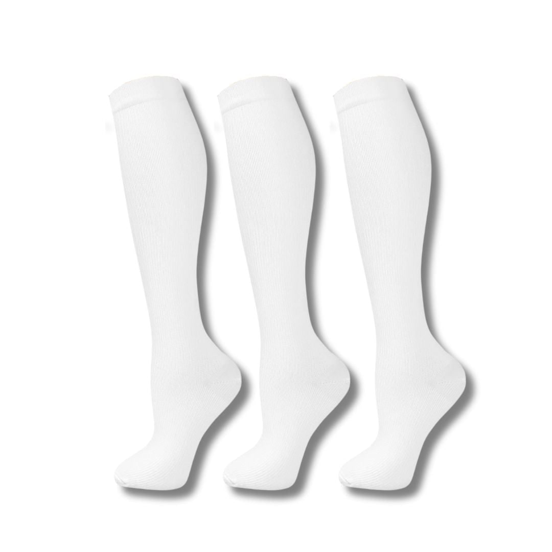 Calze a compressione da donna, al ginocchio, per migliorare circolazione e salute gambe durante viaggi e sport.