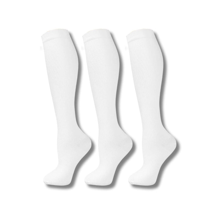 Calze a compressione da donna, al ginocchio, per migliorare circolazione e salute gambe durante viaggi e sport.