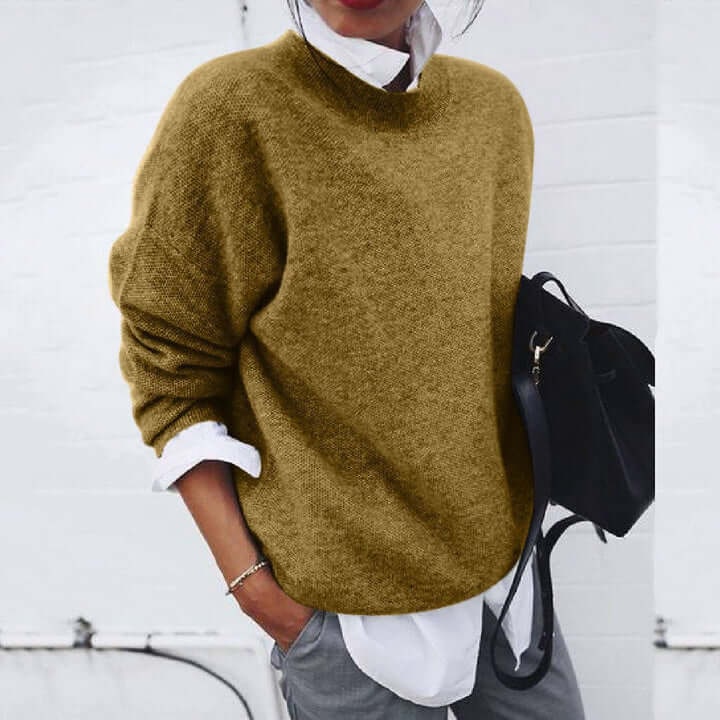 Maglione donna oversize girocollo con polsini a costine, ideale per autunno/inverno, look casual e confortevole.