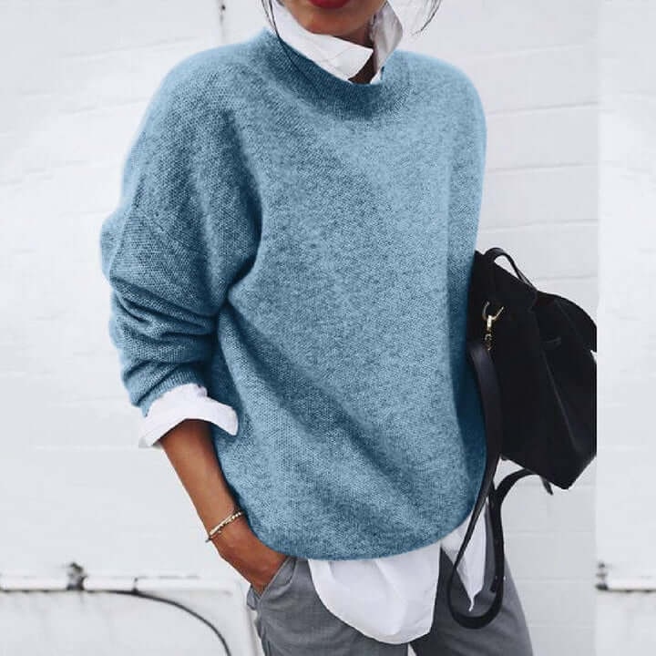 Comodo maglione donna oversize a girocollo, vestibilità rilassata e polsini a costine, perfetto per l'inverno casual.