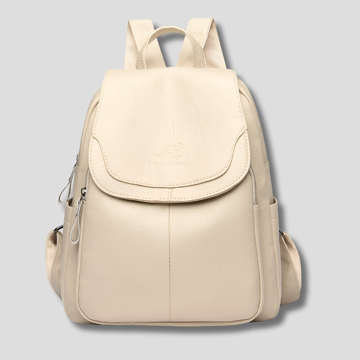 Zaino elegante donna, con patta e goffrature. L'accessorio perfetto per l'ufficio e il tempo libero.
