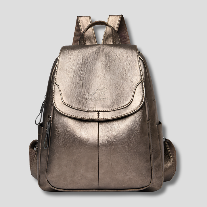 Zainetto versatile da donna, con patta superiore e dettagli goffrati. Ideale per uno stile casual chic.