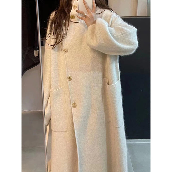 Cardigan donna oversize confortevole, con elegante collo ad imbuto e maniche a palloncino. Stile casual quotidiano.