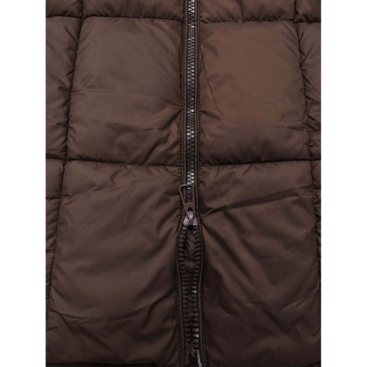 Cappotto invernale donna in piumino, lungo e trapuntato, essenziale per la moda invernale chic.