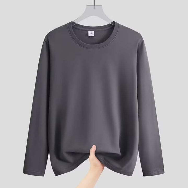 Maglietta donna a maniche lunghe girocollo con vestibilità rilassata. Ideale per un look casual e confortevole in autunno.