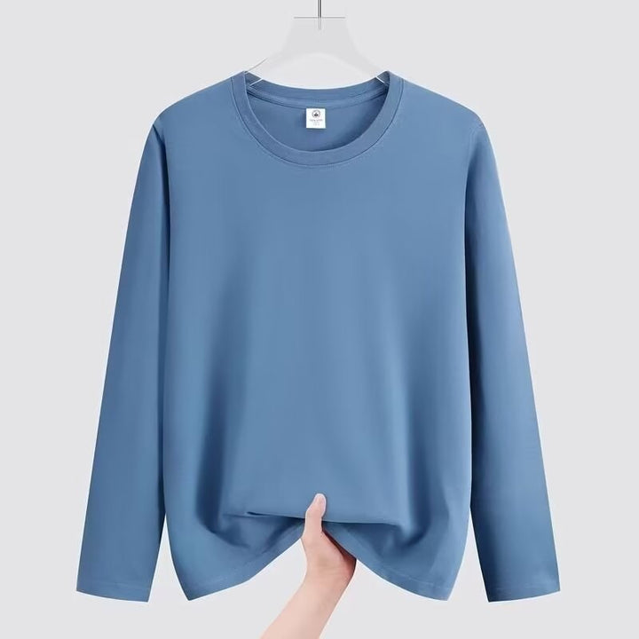 Top donna basic a maniche lunghe girocollo, vestibilità comoda e versatile. Perfetto per un outfit casual quotidiano.
