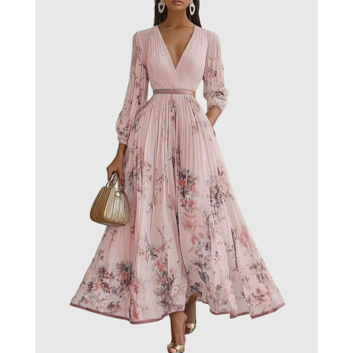 Vestito floreale lungo con pieghe e scollo a V profondo, vestibilità comoda e maniche. Elegante e casual.
